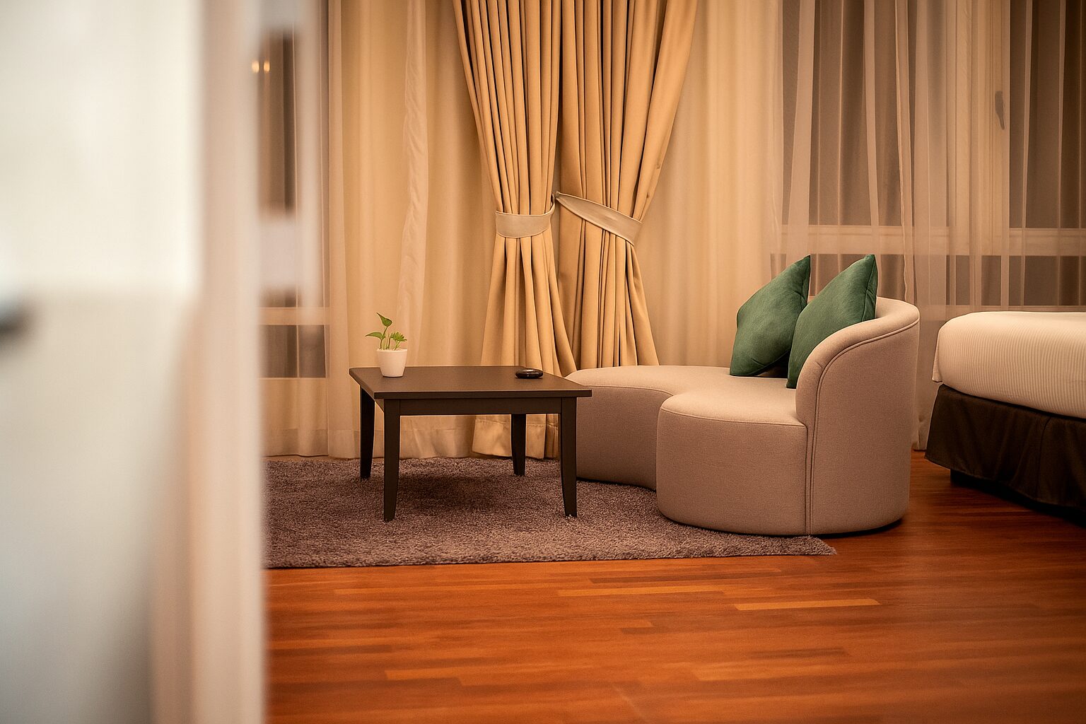 Premier Studio Suite living area at Cormar Suites