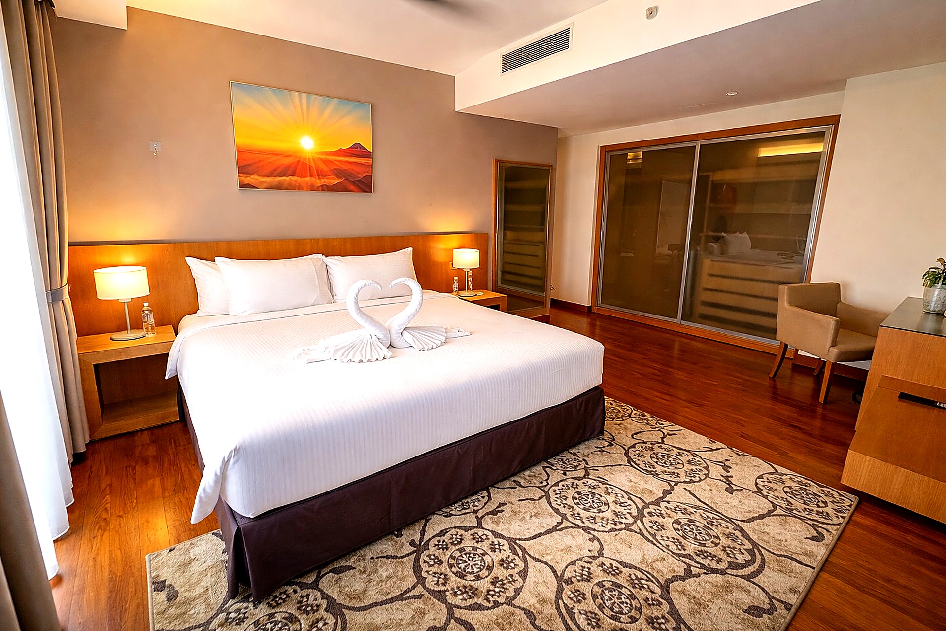 Master bedroom with swan towels