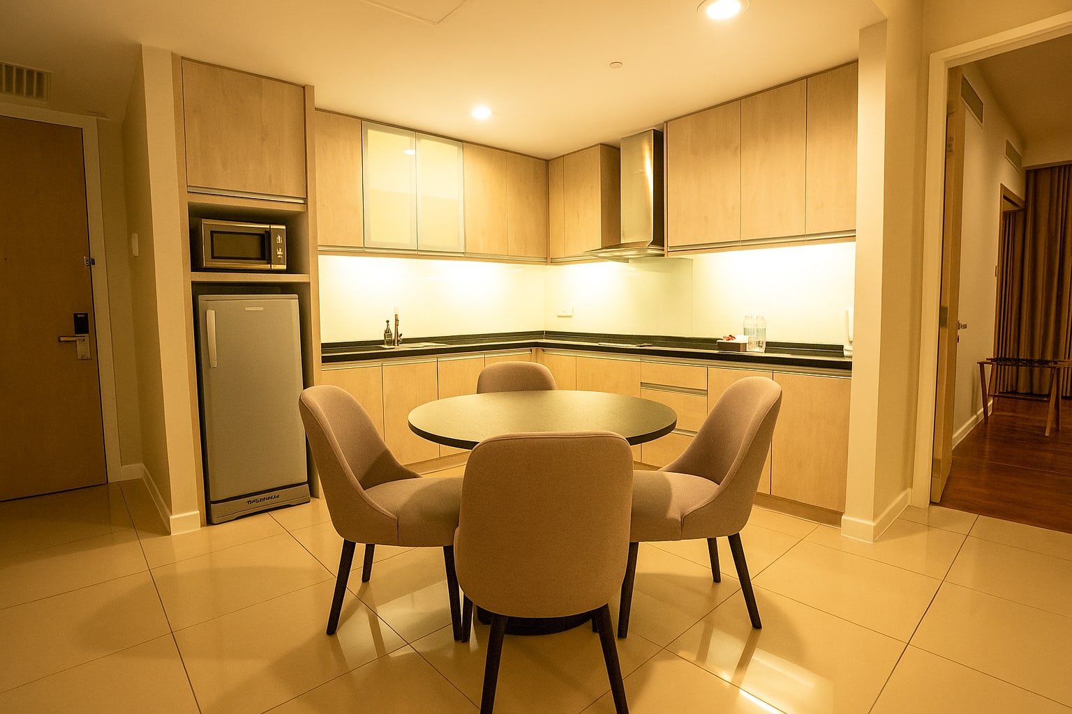 Kitchen and dining area in Premier One-Bedroom Suite